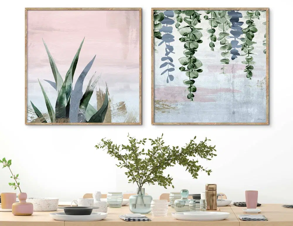 תמונות קנבס Fallen Leaves Growth Pink Blue - שני הדפסי קנבס ממוסגרים בפורמט ריבועי בגווני ורוד כחול ירוק עם נגיעות ברונזה